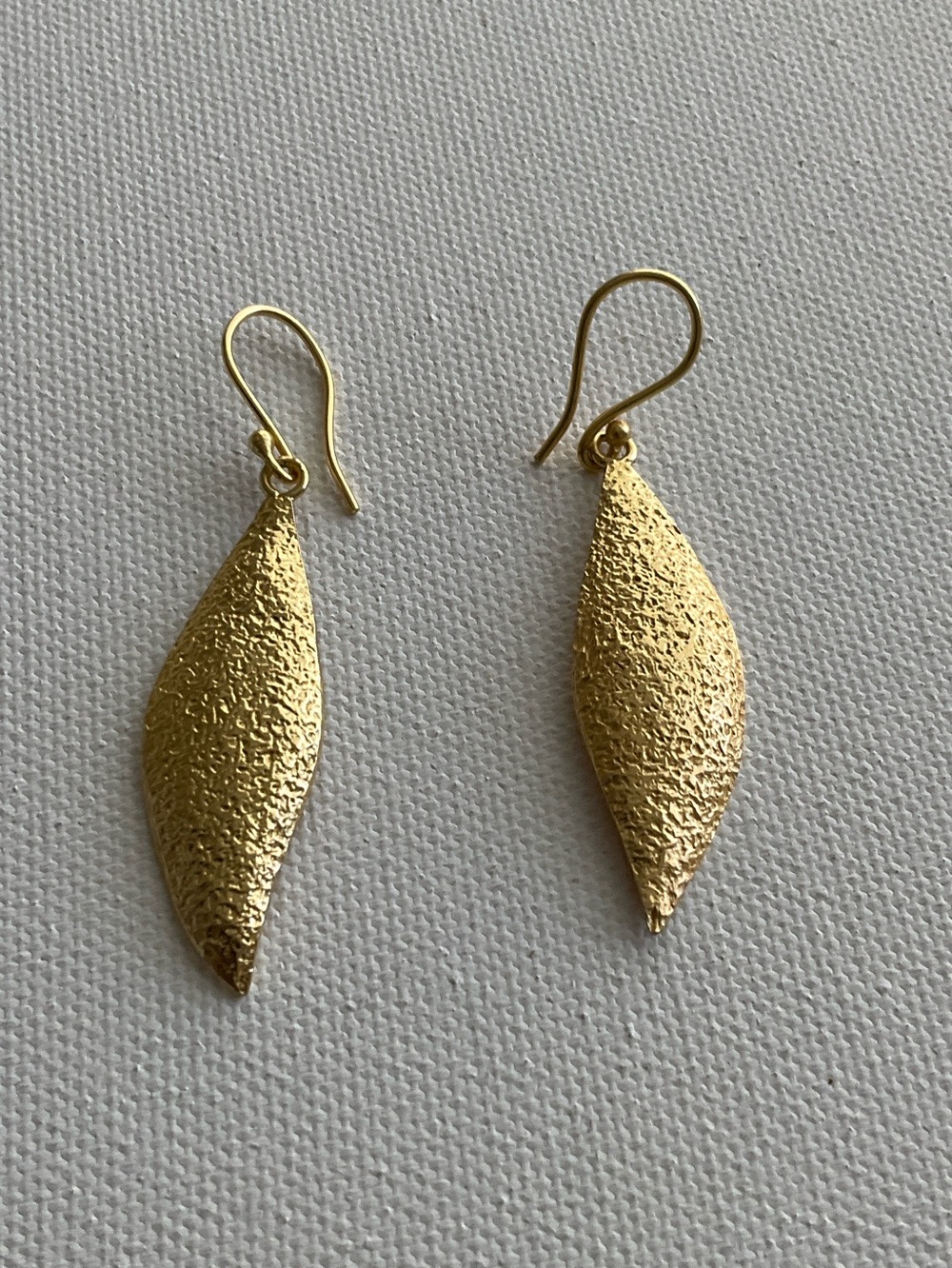 Gold Tone Textured Leaf Drop Earrings